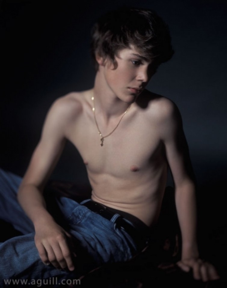 Young boy topless